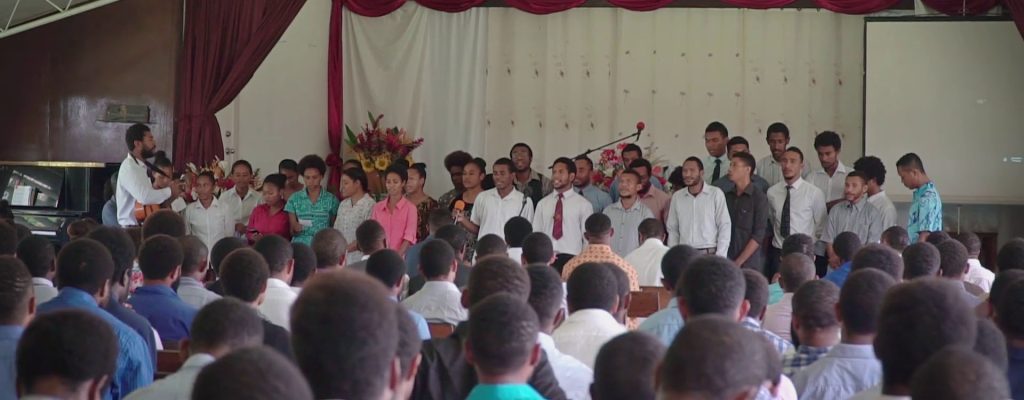 students-singing-in-church